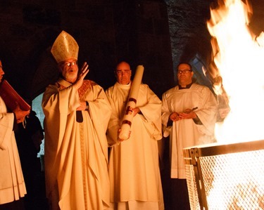 Cardinal O’Malley celebrates the Easter Vigil at the Cathedral of the Holy Cross March 30, 2013.
Pilot photos by Christopher S. Pineo 
