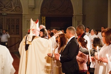 Cardinal O’Malley celebrates the Easter Vigil at the Cathedral of the Holy Cross March 30, 2013.
Pilot photos by Christopher S. Pineo 
