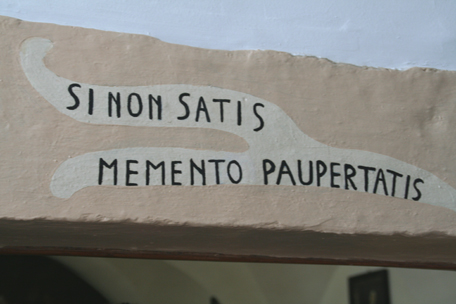 cap-saying-above-door.jpg