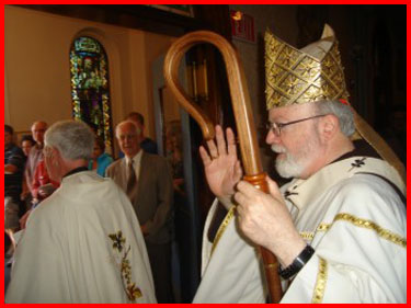 blog2007-06-15-cardinal-omalley-about-to-enter-the-foyer-of-holy-family-church.jpg