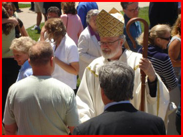 blog2007-06-15-cardinal-omalley-outside-holy-family-church-picture-1.jpg