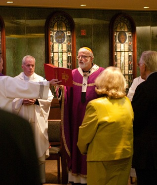 Boston members of the Order of Malta gather at the Pastoral Center of the Archdiocese of Boston Dec. 2, 2008 for Mass with Cardinal Sean P. O'Malley and a fund raising dinner.
Pilot photo/ Neil W. McCabe