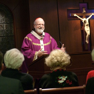 Boston members of the Order of Malta gather at the Pastoral Center of the Archdiocese of Boston Dec. 2, 2008 for Mass with Cardinal Sean P. O'Malley and a fund raising dinner.
Pilot photo/ Neil W. McCabe