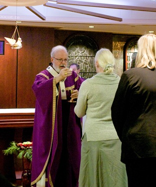 Boston members of the Order of Malta gather at the Pastoral Center of the Archdiocese of Boston Dec. 2, 2008 for Mass with Cardinal Sean P. O'Malley and a fund raising dinner.
Pilot photo/ Neil W. McCabe