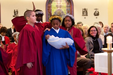 Mass and dinner Dec. 9, 2008 at the Pastoral Center of the Archdiocese of Boston to thank members of the Yawkey Foundation for their donation of $15 million to support Catholic schools in Dorchester-Mattapan.  Performing at the Mass were two groups of students from Pope John Paul II Catholic Academy in Dorchester.<br /> Photo by Gregory L. Tracy/ The Pilot<br /> 