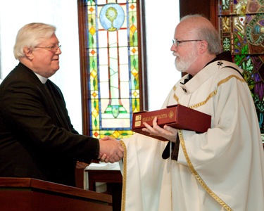 Presentation of the polyglot bible to Cardinal Seán P. O’Malley by representatives of the American Bible Society in the chapel of the Archdiocese of Boston’s Pastoral Center Jan. 13, 2009.<br /> Pilot photo/ Gregory L. Tracy