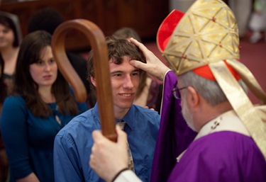 College age Confirmations at Holy Cross Cathedral Saturday March 28. 