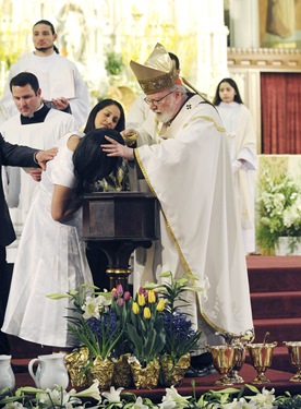 Children who were baptized during an Easter vigil with Cardinal Sean P. O'Malley at the Cathedral of the Holy Cross in Boston, Saturday, April 11, 2009. (Photo/Lisa Poole)