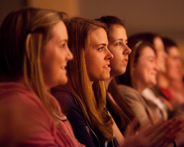 Some of the girls at the Catholic Youth Rally at Xaverian HS. listen to Cardinal Sean.