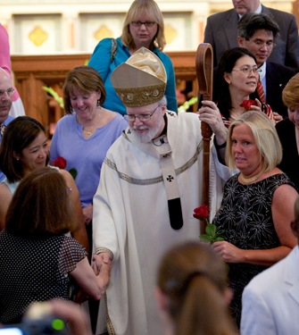 Couples celebrating their 25th and 50th wedding anniversaries participate in a special Mass with Cardinal Sean P. O’Malley at the Cathedral of the Holy Cross June 7, 2009. Photo by Gregory L. Tracy, The Pilot 