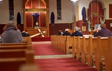 Cardinal Seán P. O’Malley prepares to hear confessions March 10, 2010 at Sacred Heart Church in East Boston as part of The Light Is On For You initiative. Pilot photo by Gregory L. Tracy