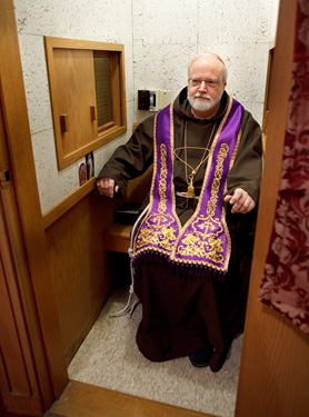 Cardinal Seán P. O’Malley prepares to hear confessions March 10, 2010 at Sacred Heart Church in East Boston as part of The Light Is On For You initiative. Pilot photo by Gregory L. Tracy