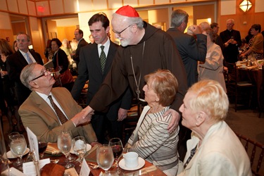 Catholic Charities Annual Spring Gala, held May 20, 2010 at the John F. Kennedy Library in Boston. At the banquet, Ken Hackett, president of Catholic Relief Services, was presented with Charities’ annual Justice and Compassion Award. Pilot photo by Gregory L. Tracy 