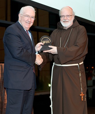 Catholic Charities Annual Spring Gala, held May 20, 2010 at the John F. Kennedy Library in Boston. At the banquet, Ken Hackett, president of Catholic Relief Services, was presented with Charities’ annual Justice and Compassion Award. Pilot photo by Gregory L. Tracy 