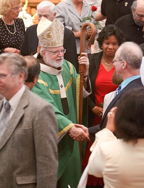 Couples celebrating their 25th, 50th and 60th anniversaries attend the Wedding Anniversary Mass celebrated by Cardinal Sean P. O'Malley June 13, 2010 at the Cathedral of the Holy Cross in Boston. Pilot photo by Gregory L. Tracy