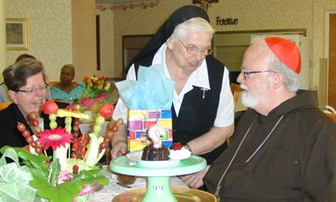 CJC_24 Sister Angela presenting Cardinal O'Malley with a birthday gift Brockton 062710 ED-ed