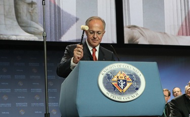 Using a gavel that belonged to the founder of the Knights of Columbus, Father Michael J. McGivney, Supreme Knight Carl A. Anderson officially commences the opening business session of the 128th Supreme Convention Aug. 3 in Washington, D.C.