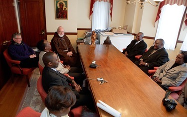 Visit by leader of the Ugandan Catholic community in Boston, March 13, 2011. Photo by Gregory L. Tracy/ The Pilot