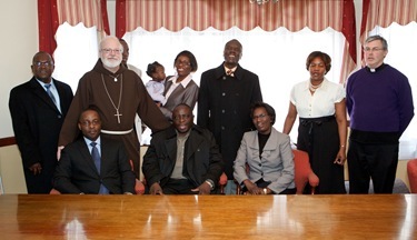 Visit by leader of the Ugandan Catholic community in Boston, March 13, 2011. Photo by Gregory L. Tracy/ The Pilot