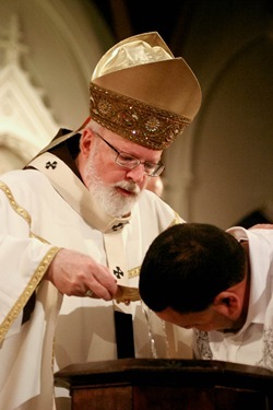 Cardinal Sean P. O'Malley celebrates the Easter Vigil April 23, 2011 at the Cathedral of the Holy Cross.  Pilot photo by Jim Lockwood