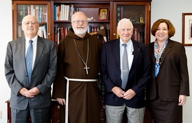 Superintendent of Schools Mary Grassa O’Neill and Cardinal O’Malley meet with Jack and Fred Sheehan May 9, 2011. Pilot photo/ Gregory L. Tracy