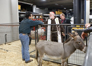 Cardinal Sean P. O'Malley visits Ringing Bros. Barnum and Bailey Circus at Boston's TD Garden  on Oct. 14, 2011 with National Circus Chaplain and Boston priest Father Gerry Hogan. Pilot photo/ Gregory L. Tracy