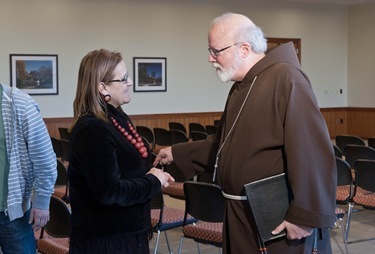 Cardinal Sean O'Malley adresses a C21 event audience on The Eucharist: The Center of Catholic Life. The event took place in the Murray Room of Yawkey Center and was the last event of a series of day long activities for the Cardinal in his visit to STM and the University in general.