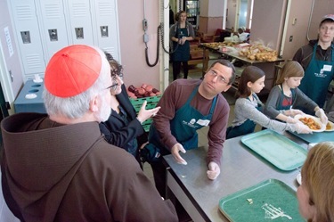 Cardinal Seán P. O’Malley visits Boston’s Pine Street Inn Dec. 24, 2011. Pilot photo/ Christopher S. Pineo