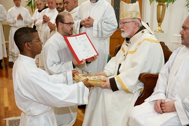 Cardinal Sean P. O'Malley institues lectors and acolytes of Redemptoris Mater Seminary June 9, 2012 at Our Lady of the Assumption Church in East Boston. Photo by Gregory L. Tracy