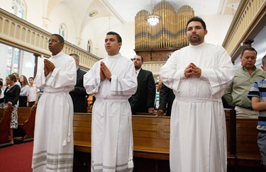 Cardinal Sean P. O'Malley institues lectors and acolytes of Redemptoris Mater Seminary June 9, 2012 at Our Lady of the Assumption Church in East Boston. Photo by Gregory L. Tracy