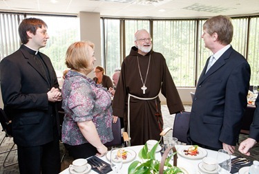 Luncheon with newly ordained, June 27, 2012. Photo by Gregory L. Tracy, The Pilot