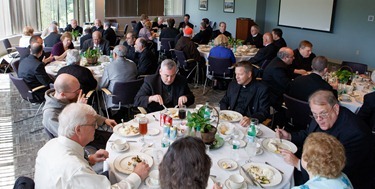 Luncheon with newly ordained, June 27, 2012. Photo by Gregory L. Tracy, The Pilot