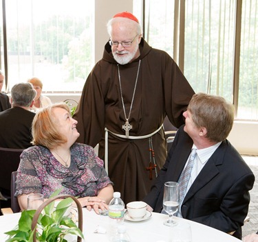 Luncheon with newly ordained, June 27, 2012. Photo by Gregory L. Tracy, The Pilot