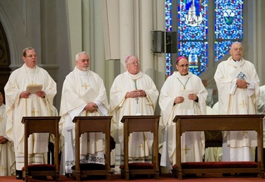 Ordination of Permanent Deacons Robert C. Balzarini, Vincent Gatto, James T. Hinkle, Michael C. Joens, Jonathan Jones, Brian K. Kean, Thomas O’Shea, Louis J. Piazza, William K. Reidy, and Paulo Torrens, Sept. 22, 2012 at the Cathedral of the Holy Cross. 
Pilot photo/ Gregory L. Tracy
