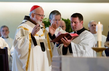 Cardinal Seán P. O’Malley celebrates a Mass at the Archdiocese of Boston’s Bethany Chapel to open the Year of Faith Oct. 11, 2012.  Afterward, members of the media were invited to observe as he sent Twitter messages on the Year of Faith and on the physician assisted suicide ballot measure.<br /><br /><br /><br /><br /><br /><br />
Pilot photo by Gregory L. Tracy