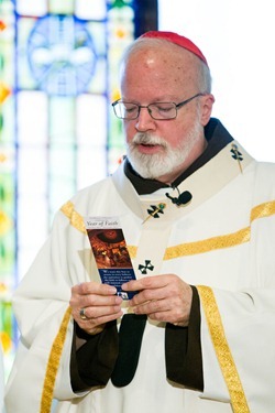 Cardinal Seán P. O’Malley celebrates a Mass at the Archdiocese of Boston’s Bethany Chapel to open the Year of Faith Oct. 11, 2012.  Afterward, members of the media were invited to observe as he sent Twitter messages on the Year of Faith and on the physician assisted suicide ballot measure.<br /><br /><br /><br /><br /><br /><br />
Pilot photo by Gregory L. Tracy