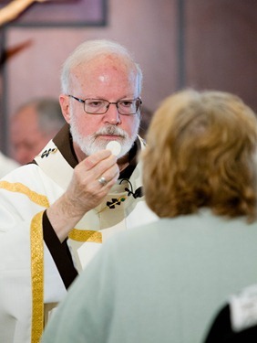 Cardinal Seán P. O’Malley celebrates a Mass at the Archdiocese of Boston’s Bethany Chapel to open the Year of Faith Oct. 11, 2012.  Afterward, members of the media were invited to observe as he sent Twitter messages on the Year of Faith and on the physician assisted suicide ballot measure.<br /><br /><br /><br /><br /><br /><br />
Pilot photo by Gregory L. Tracy