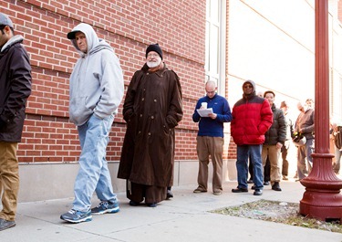 Cardinal Seán P. O’Malley waits in line to vote at Cathedral High School in Boston’s South End Nov. 6, 2012.
Pilot photo/ Gregory L. Tracy
