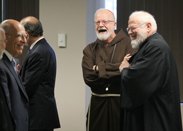 Religious leaders gather after effort on Question 2. Pilot photo/ Gregory L. Tracy