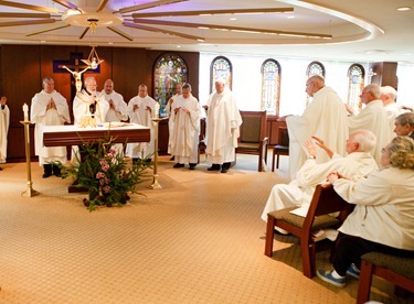 Mass with priests from Regina Cleri Dec. 6, 2012. Pilot photo/ Gregory L. Tracy