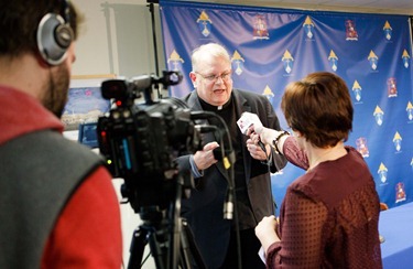 Cardinal Seán P. O’Malley, Msgr. James Moroney and Bishop Robert P. Deeley speak to the media about the resignation of Pope Benedict XVI Feb. 12, 2013 at the archdiocese’s Pastoral Center. 
Pilot photo/ Gregory L. Tracy
