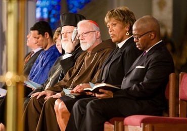 Boston Cardinal Sean P. O'Malley joins Boston faith leaders at the “Healing Our City” interfaith prayer service to honor those affected by the Boston Marathon bombings, held at the Cathedral of the Holy Cross in Boston April 18.<br /><br /><br /><br /><br /> Pilot photo/ Gregory L. Tracy<br /><br /><br /><br /><br /> 