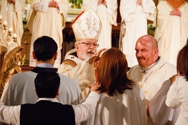 Cardinal O’Malley celebrates the Easter Vigil at the Cathedral of the Holy Cross March 30, 2013.
Pilot photos by Christopher S. Pineo 
