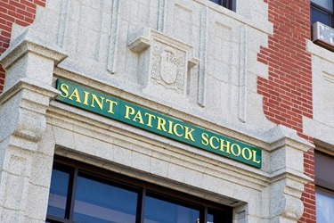 Cardinal Sean P. O’Malley joins archdiocesan employees working to beautify St. Patrick Church in Roxbury as part of Parish Service Week, May 13, 2013. After the spring cleaning, Cardinal Sean visited St. Patrick School spending time with students and with the classmates of Barry Brinson, a 7th grade student at the school who was killed May 9 in a traffic accident in Allston.
Pilot photo by Gregory L. Tracy
