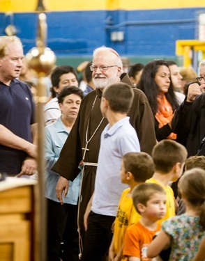 Cardinal Sean O'Malley meets with membersof the Neocatechumenal Way at Immaculate Conception School in Revere June 17, 2013. Photo by Gregory L. Tracy