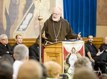 Cardinal Sean O'Malley meets with membersof the Neocatechumenal Way at Immaculate Conception School in Revere June 17, 2013. Photo by Gregory L. Tracy