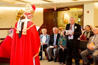 Xaverian Brother Philip White, who is celebrating 70 years of religious life, gathers with family and friends at Mass celebrated by Cardinal Sean P. O’Malley June 5, 2013 at the archdiocese’s Pastoral Center in Braintree, Mass.  During the Mass Brother Philip renewed his religious vows.
Pilot photo by Gregory L. Tracy
