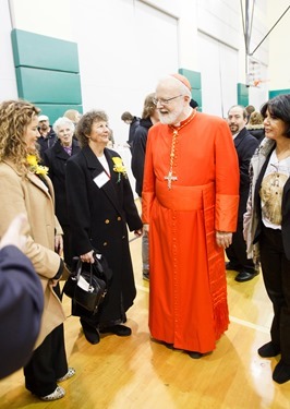 Cardinal Seán P. O'Malley greets Cheverus Award recipients and their guests at a reception at Cathedral High School following the Nov. 24, 2013 Cheverus Award ceremony.
Pilot photo/ Gregory L. Tracy 
