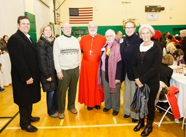 Cardinal Seán P. O'Malley greets Cheverus Award recipients and their guests at a reception at Cathedral High School following the Nov. 24, 2013 Cheverus Award ceremony.
Pilot photo/ Gregory L. Tracy 
