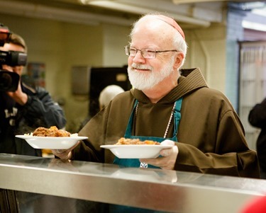 Cardinal Seán P. O'Malley, Boston Mayor-elect Marty Walsh and Sen. Edward Markey serve meals at Pine Street Inn Dec. 24, 2013. Pilot photo by Gregory L. Tracy